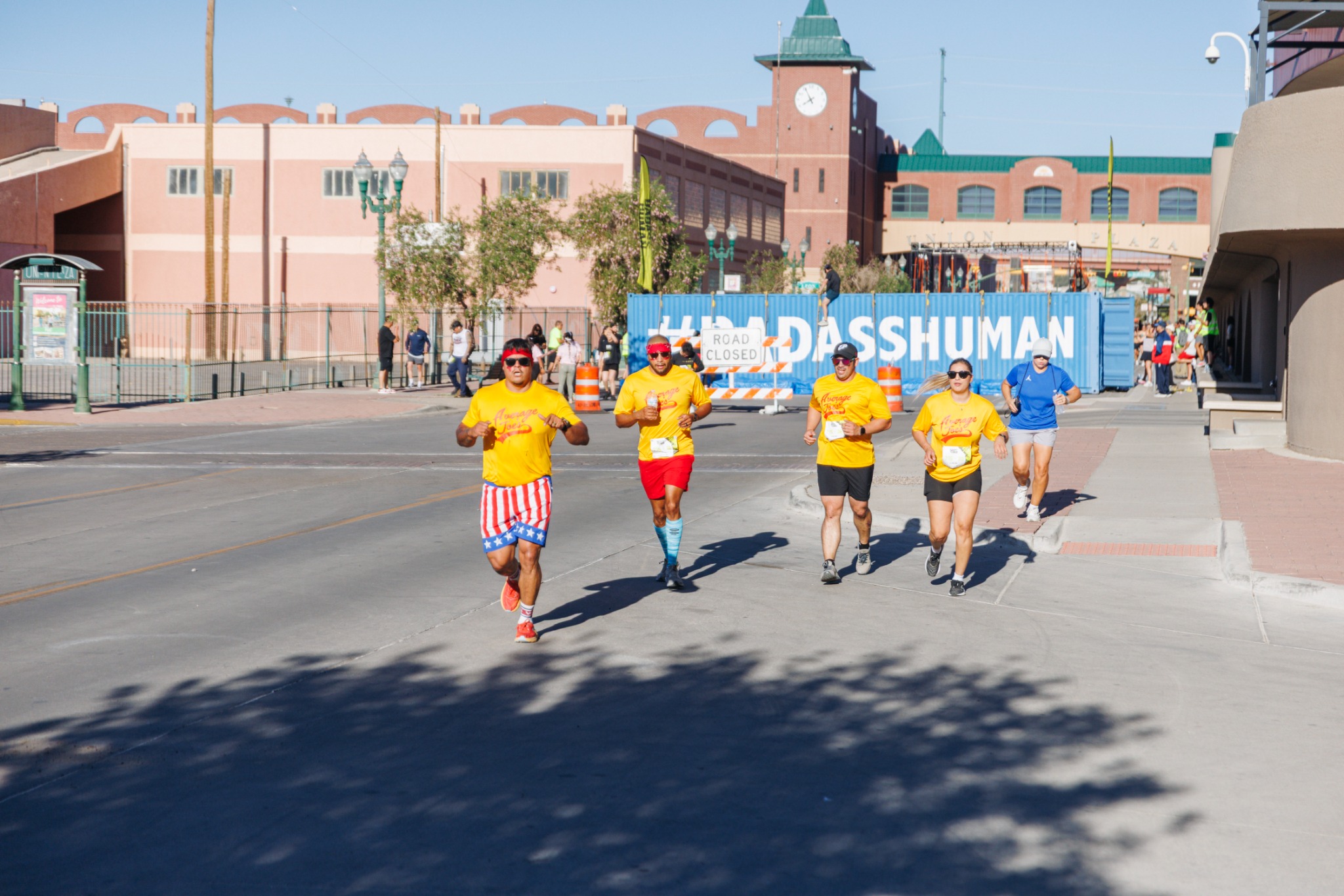 A group running together through Downtown El Paso during the Badass Human Race